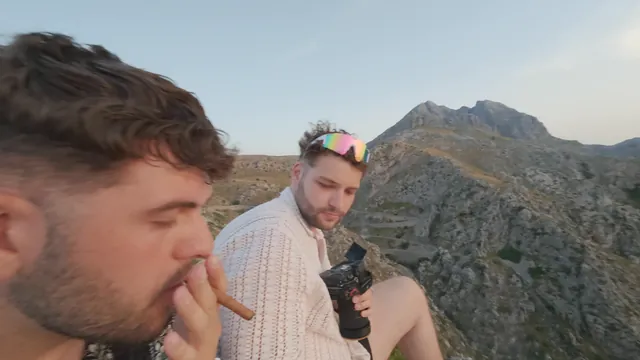 Two photographers with a camera above the Mallorca coast